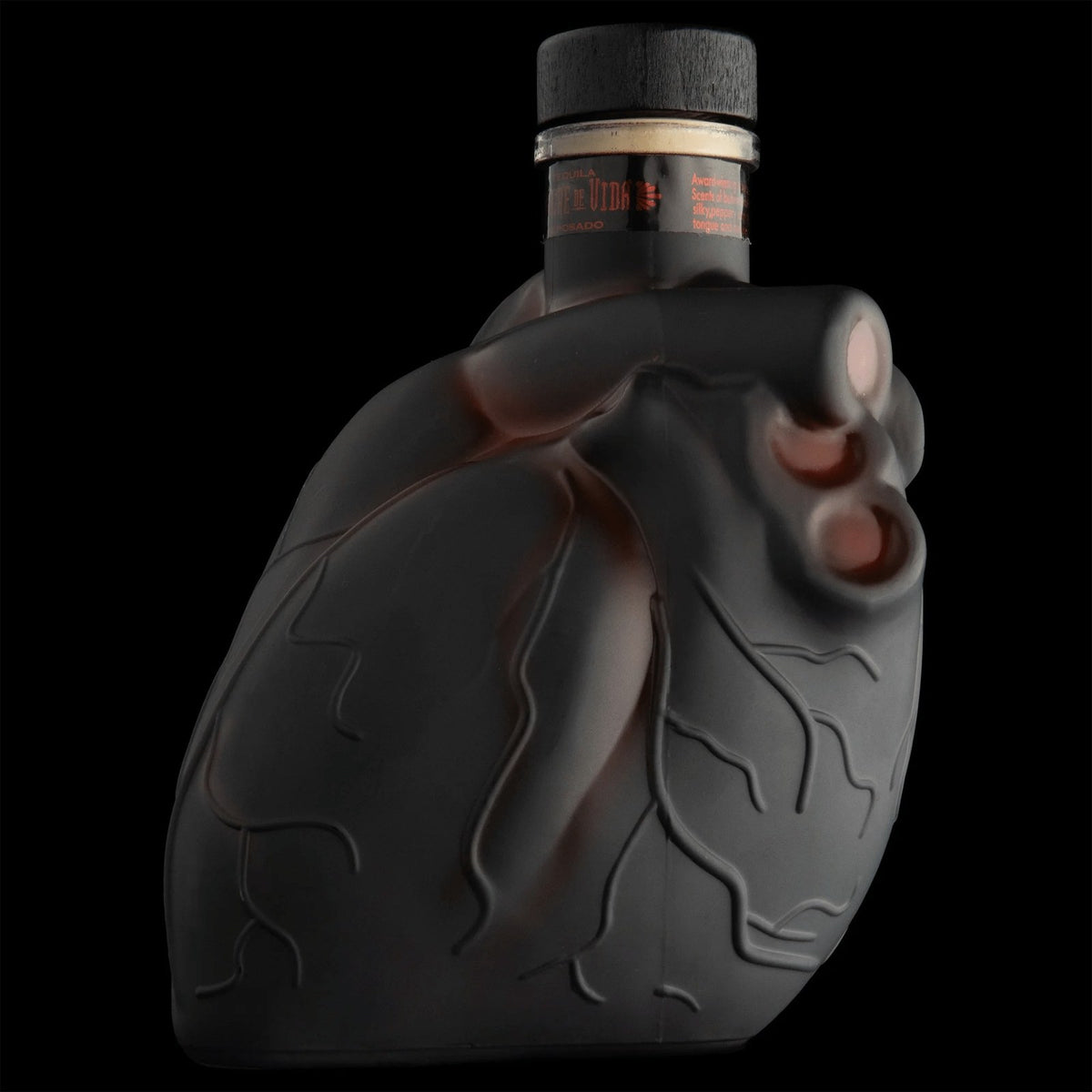 Sangre de Vida Reposado Tequila bottle, 110 proof, front view on white