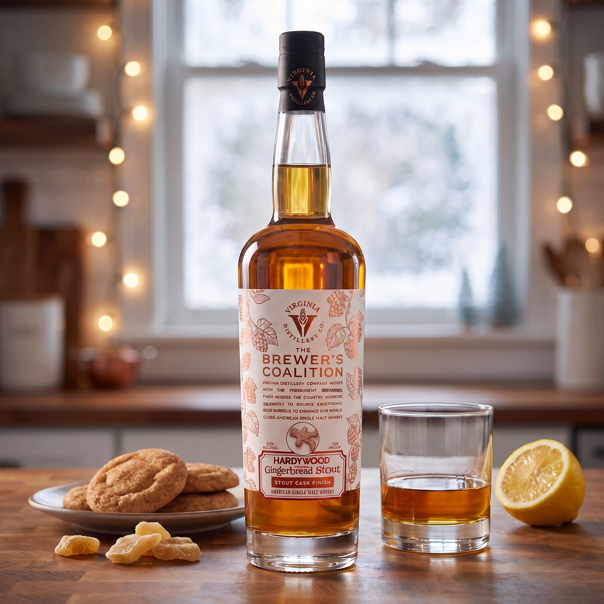 Virginia Distillery Co. Brewer's Coalition Hardywood Gingerbread Stout Cask Finish single malt on a kitchen counter with snickerdoodle cookies, candied ginger and lemon